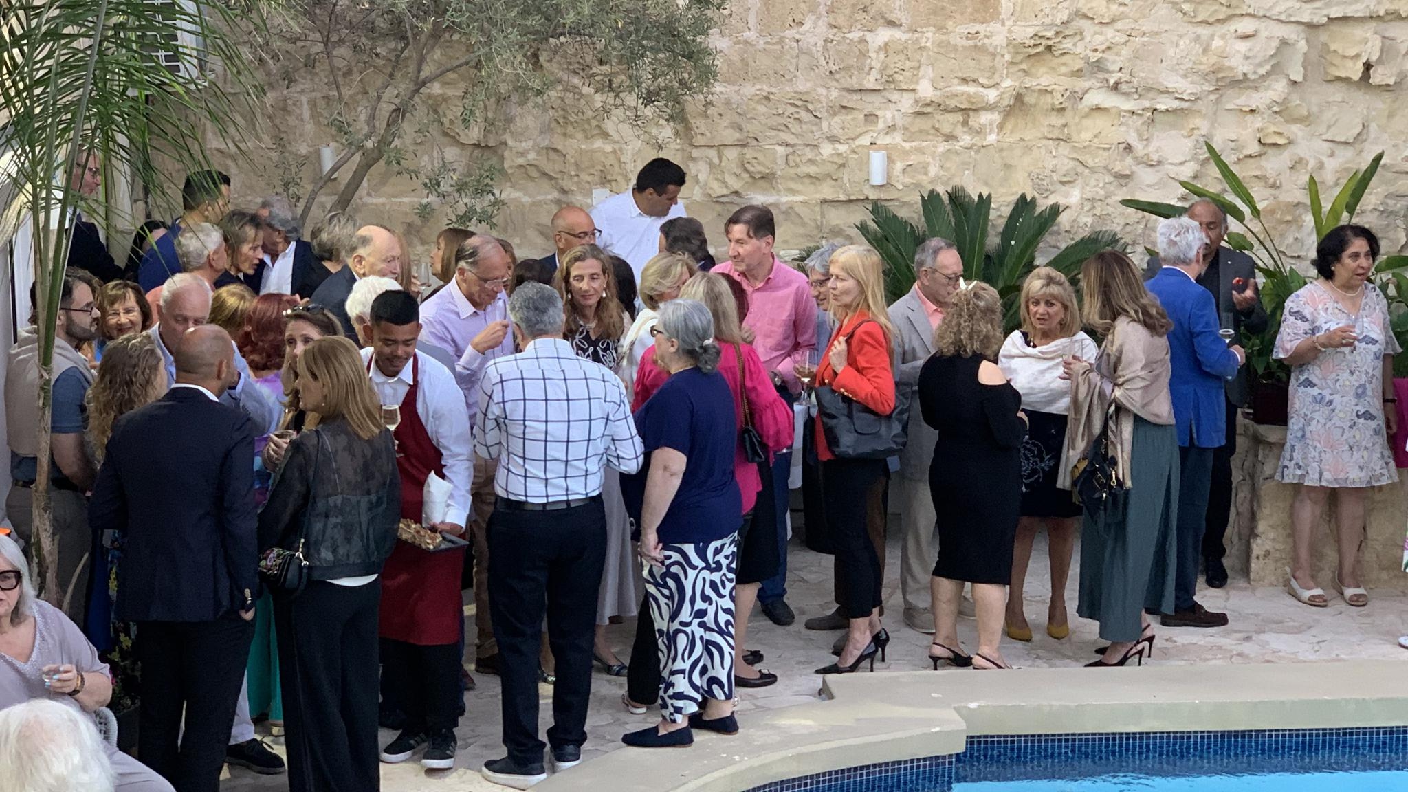 Guests enjoying the fundraising cocktail party