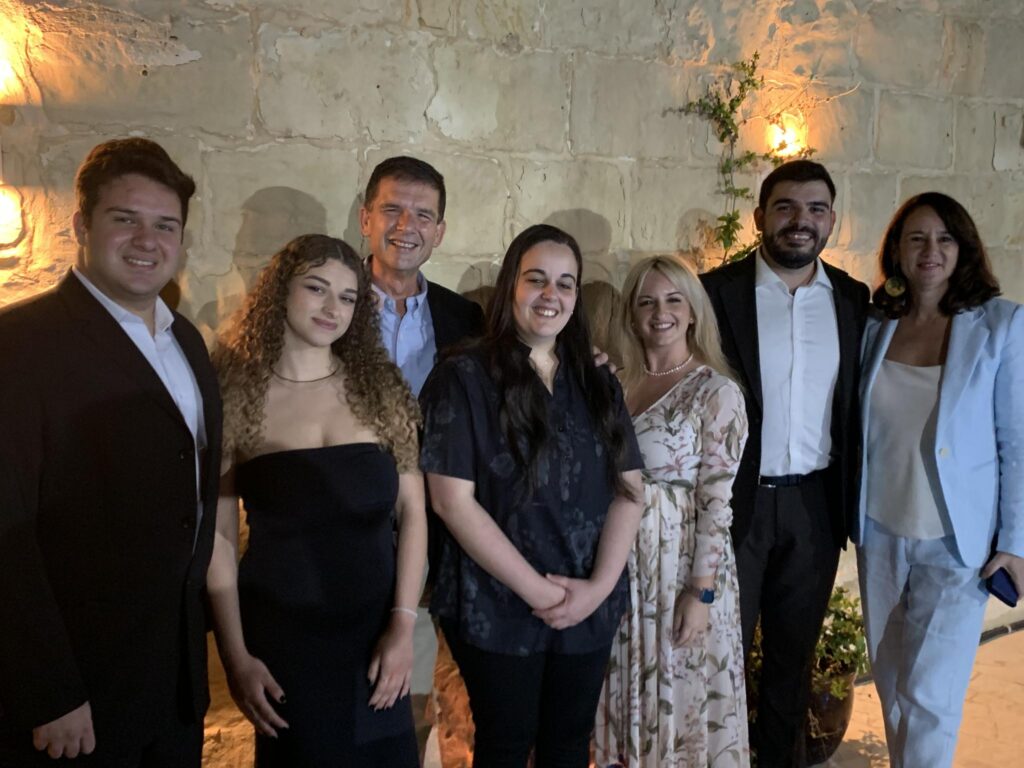 The four young singers, pianist together with Club President Godfrey Swain and Soprano Gillian Zammit from Opera Nova