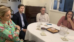 New members listening attentively