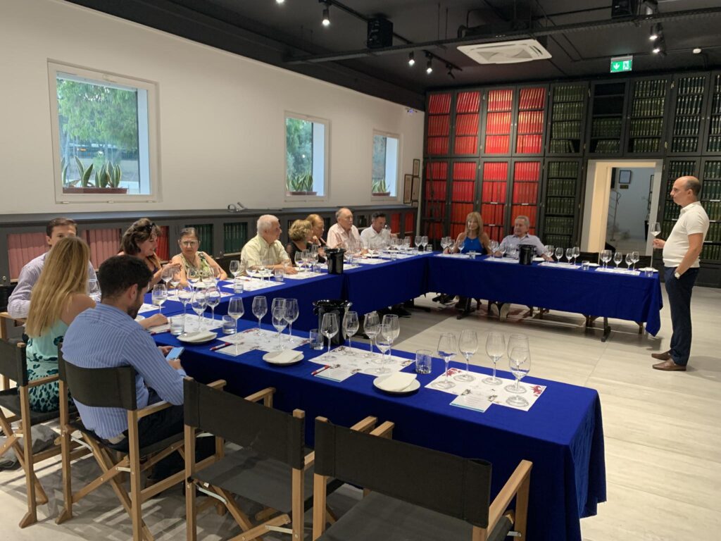 Rotarians enjoying and discussing the taste of wine