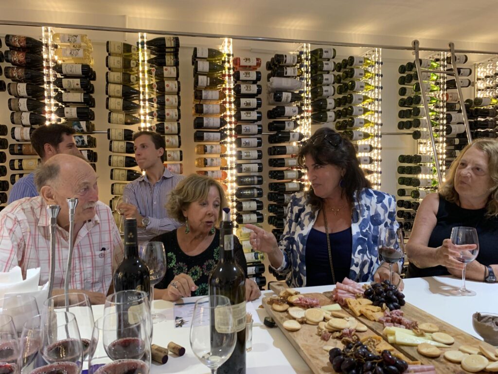 Socialising over a delicious food platter accompanied by excellent wines