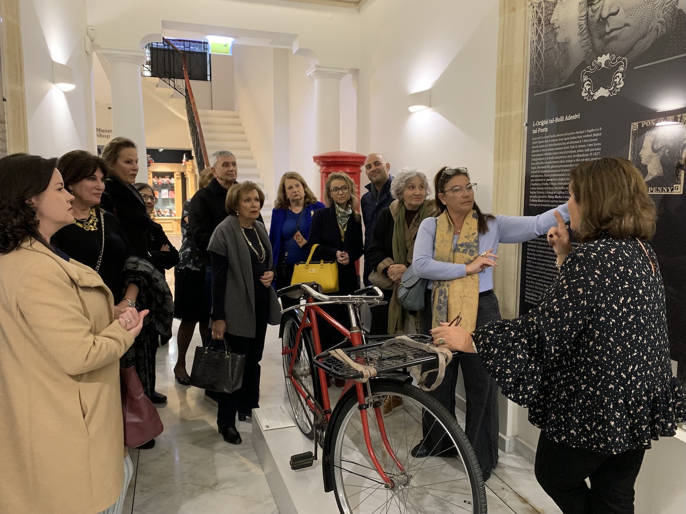Rotarians listening attentively to the origins of the Penny Black stamp