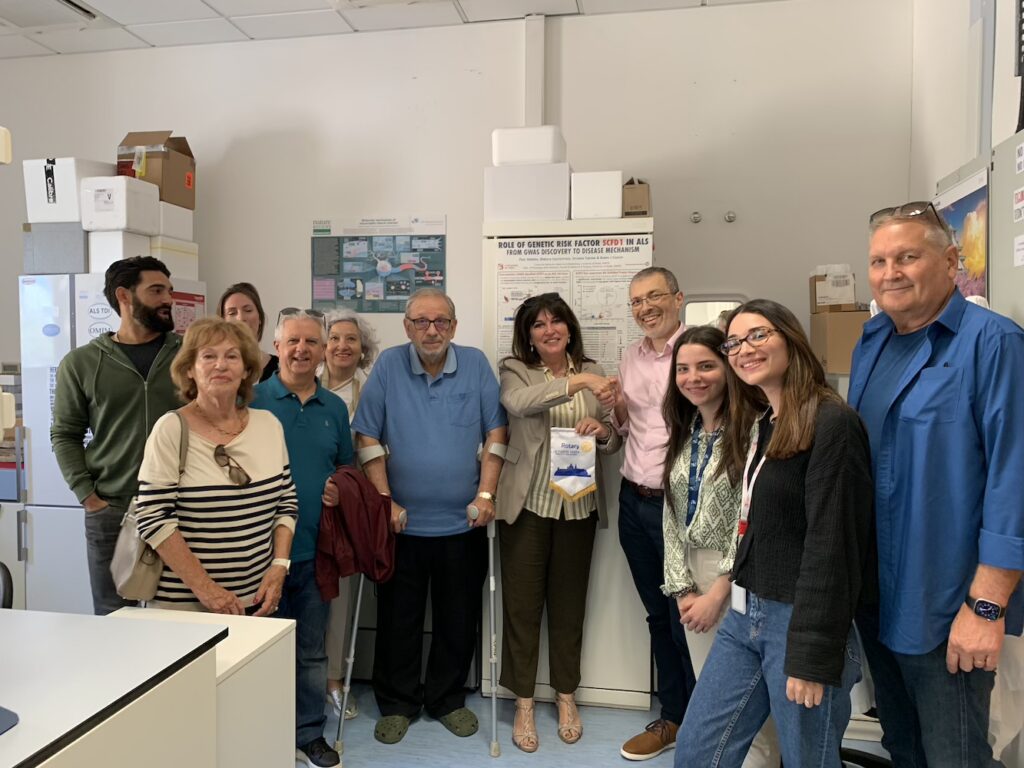 Rotarians and researchers in the ALS lab