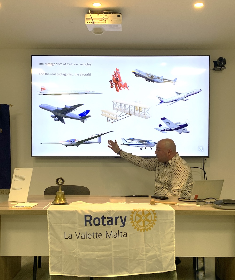 Tancredi explaining the various types of aircraft